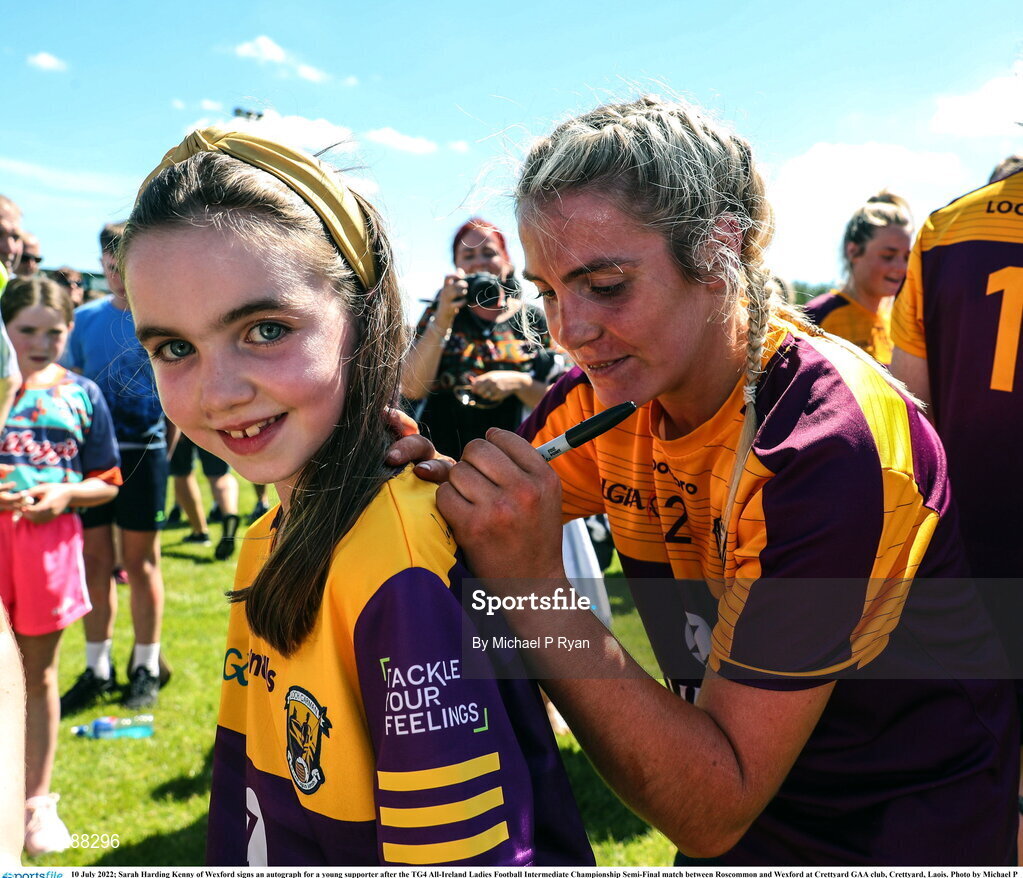 10 July 2022; Sarah Harding Kenny of Wexford signs an autograph for a young supporter after the TG4 All-Ireland Ladies Football Intermediate Championship Semi-Final match between Roscommon and Wexford at Crettyard GAA club, Crettyard, Laois. Photo by Michael P Ryan/Sportsfile