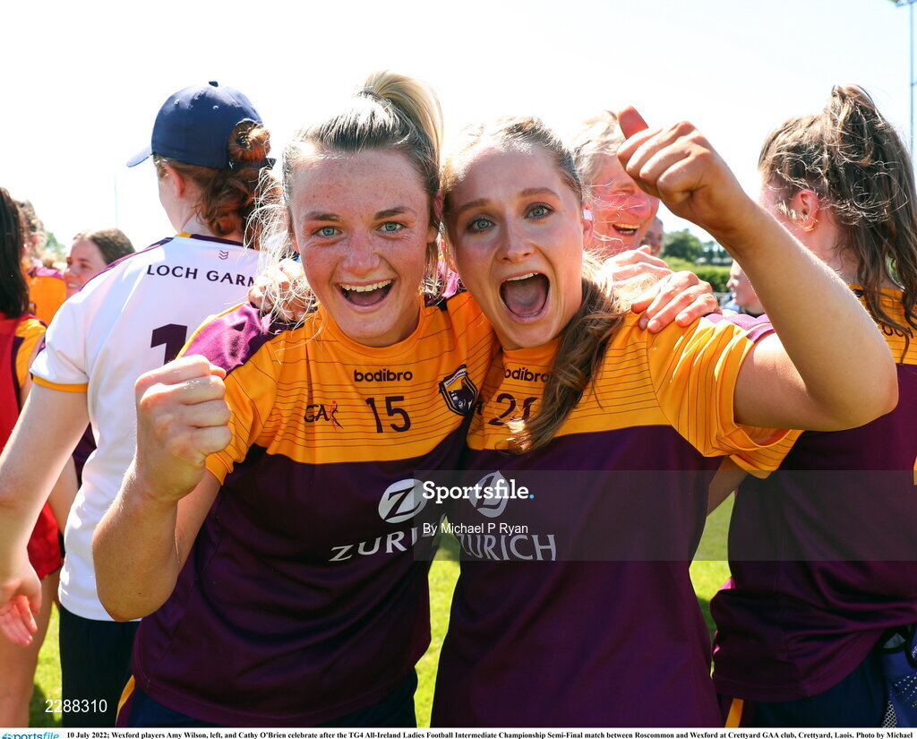 10 July 2022; Wexford players Amy Wilson, left, and Cathy O'Brien celebrate after the TG4 All-Ireland Ladies Football Intermediate Championship Semi-Final match between Roscommon and Wexford at Crettyard GAA club, Crettyard, Laois. Photo by Michael P Ryan/Sportsfile
