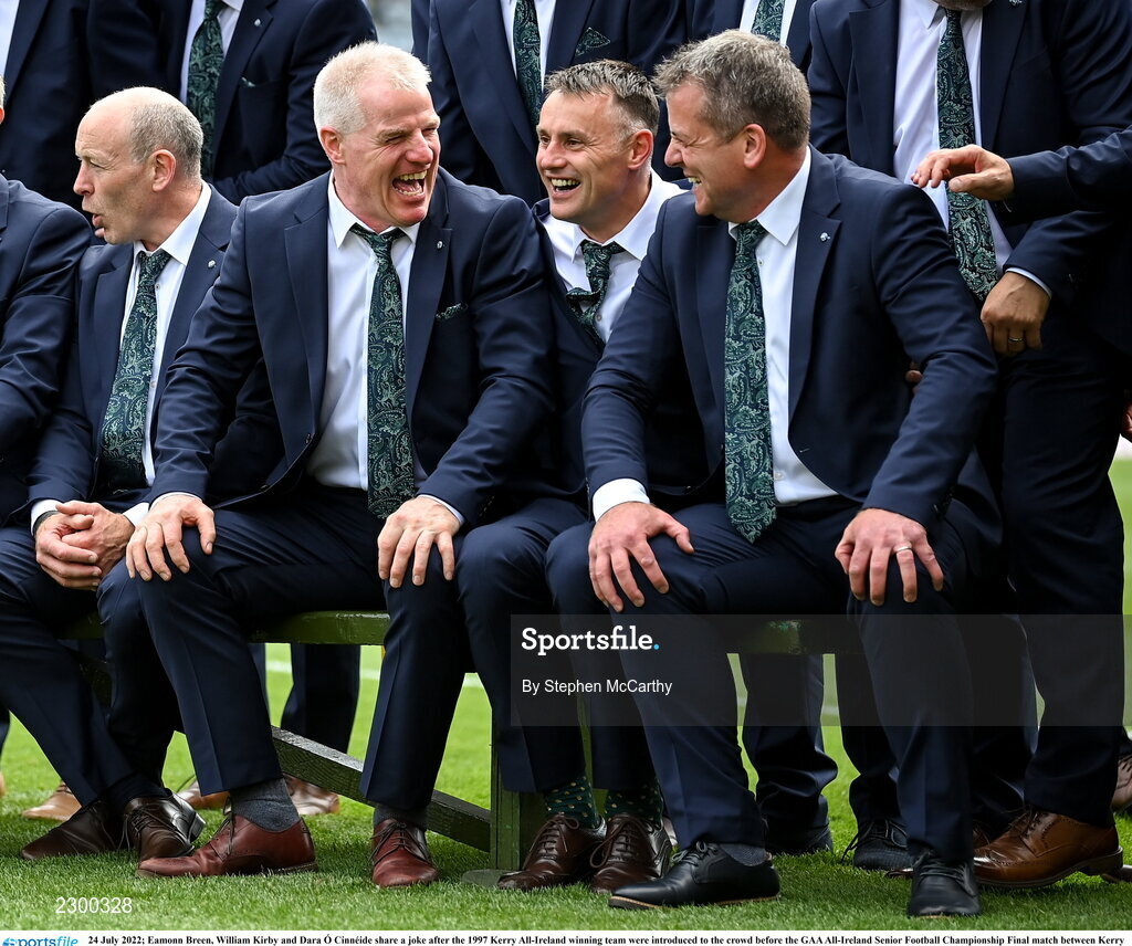 24 July 2022; Eamonn Breen, William Kirby and Dara Ó Cinnéide share a joke after the 1997 Kerry All-Ireland winning team were introduced to the crowd before the GAA All-Ireland Senior Football Championship Final match between Kerry and Galway at Croke Park in Dublin. Photo by Stephen McCarthy/Sportsfile