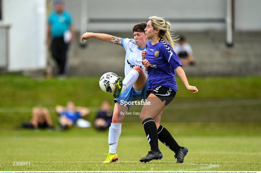 6 August 2022; Jess Hunt of Eastern Women's Football League in action against Chloe Mythen of Wexford & District Women's League during the FAI Women's Angela Hearst InterLeague Cup Final match between Wexford & District Women's League and Eastern Women's Football League at Arklow Town FC, in Wicklow. Photo by Seb Daly/Sportsfile