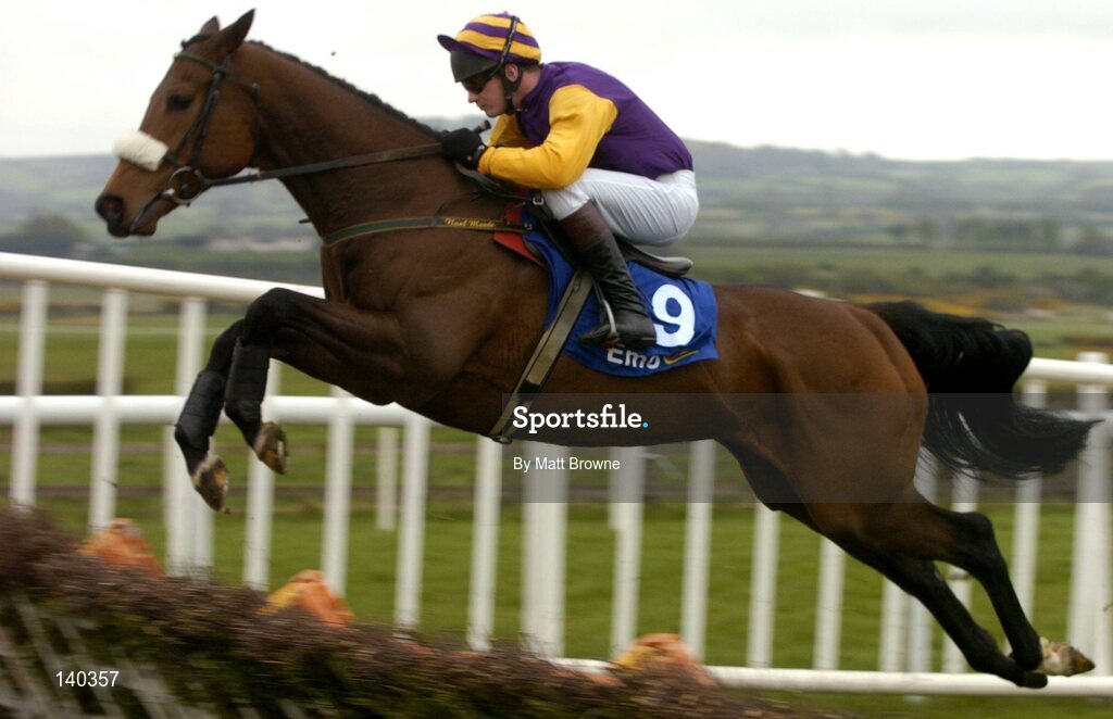 30 April 2004; Harchibald, with Paul Carberry up, jumps the last during the Emo Oil Champion Hurdle, Punchestown Racecourse, Co. Kildare. Picture credit; Matt Browne / SPORTSFILE