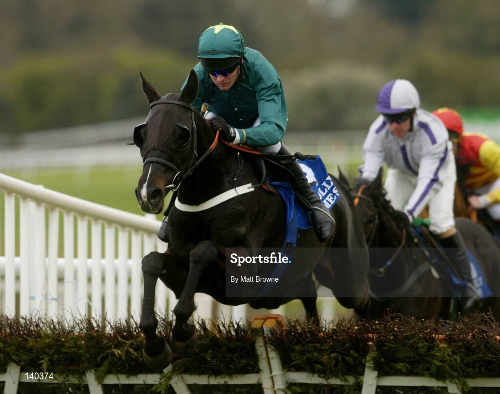 30 April 2004; Kildare, with Barry Gerraghty up, jumps the last during the Menolly Homes Champion Novice Hurdle, Punchestown Racecourse, Co. Kildare. Picture credit; Matt Browne / SPORTSFILE