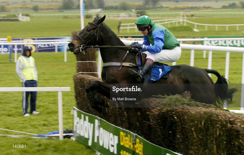 30 April 2004; Splendour, with Garreth Cotter up, jumps the last during the Sharp Minds Betfair Novice Handicap Chase, Punchestown Racecourse, Co. Kildare. Picture credit; Matt Browne / SPORTSFILE