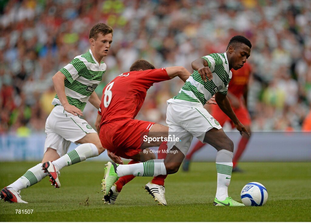 10 August 2013; Darnell Disher, Glasgow Celtic XI, in action against Steven Gerrard, Liverpool XI. Dublin Decider, Liverpool XI v Glasgow Celtic XI, Aviva Stadium, Lansdowne Road, Dublin. Picture credit: Oliver McVeigh / SPORTSFILE