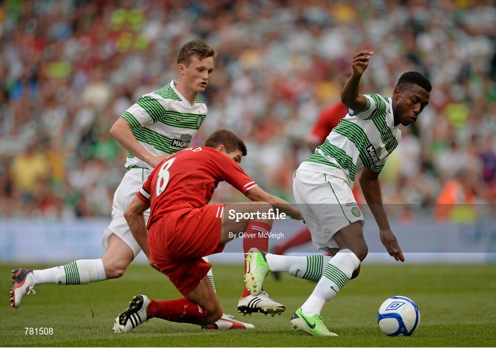 10 August 2013; Darnell Disher, Glasgow Celtic XI, in action against Steven Gerrard, Liverpool XI. Dublin Decider, Liverpool XI v Glasgow Celtic XI, Aviva Stadium, Lansdowne Road, Dublin. Picture credit: Oliver McVeigh / SPORTSFILE