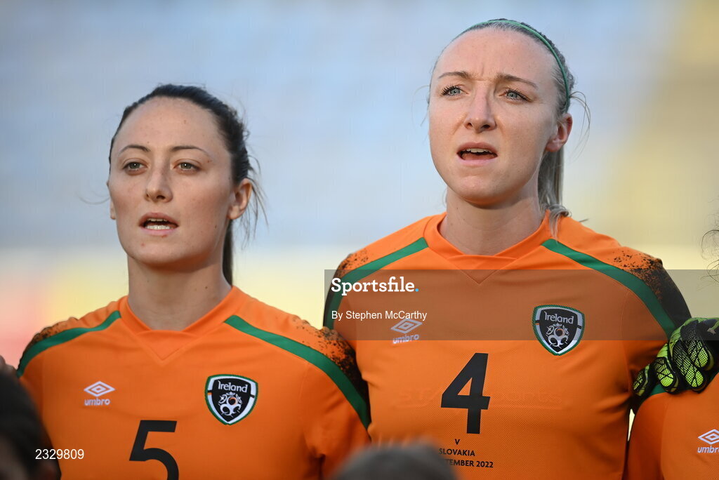6 September 2022; Louise Quinn, right, and Megan Campbell of Republic of Ireland during the playing of Amhrán na bhFiann before the FIFA Women's World Cup 2023 Qualifier match between Slovakia and Republic of Ireland at National Training Centre in Senec, Slovakia. Photo by Stephen McCarthy/Sportsfile