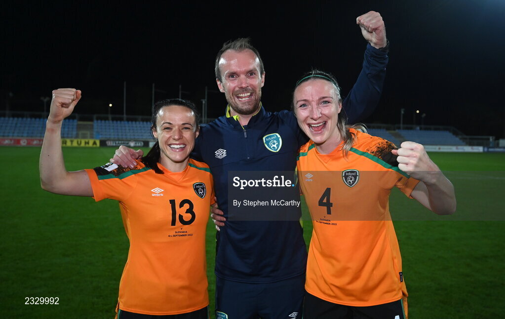 6 September 2022; Republic of Ireland players Áine O'Gorman, left, and Louise Quinn, right with Republic of Ireland video analyst Andrew Holt after the FIFA Women's World Cup 2023 Qualifier match between Slovakia and Republic of Ireland at National Training Centre in Senec, Slovakia. Photo by Stephen McCarthy/Sportsfile