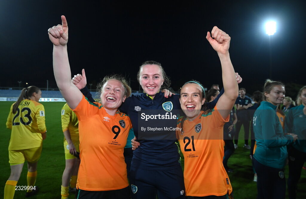 6 September 2022; Republic of Ireland players Amber Barrett, left, and Ciara Grant, right, with Republic of Ireland StatSports technician Niamh McDaid after the FIFA Women's World Cup 2023 Qualifier match between Slovakia and Republic of Ireland at National Training Centre in Senec, Slovakia. Photo by Stephen McCarthy/Sportsfile