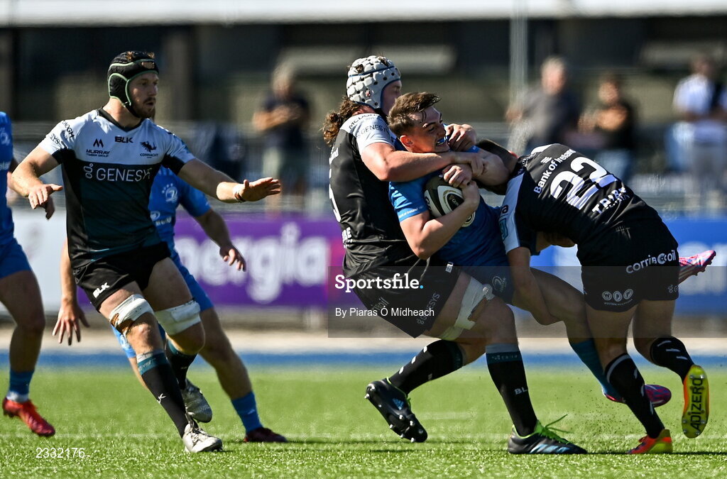 10 September 2022; Craig Adams of Leinster A is tackled by John Devine, right, and Darragh Murray of Connacht A during the A Interprovincial match between Leinster A and Connacht A at Energia Park in Dublin. Photo by Piaras Ó Mídheach/Sportsfile