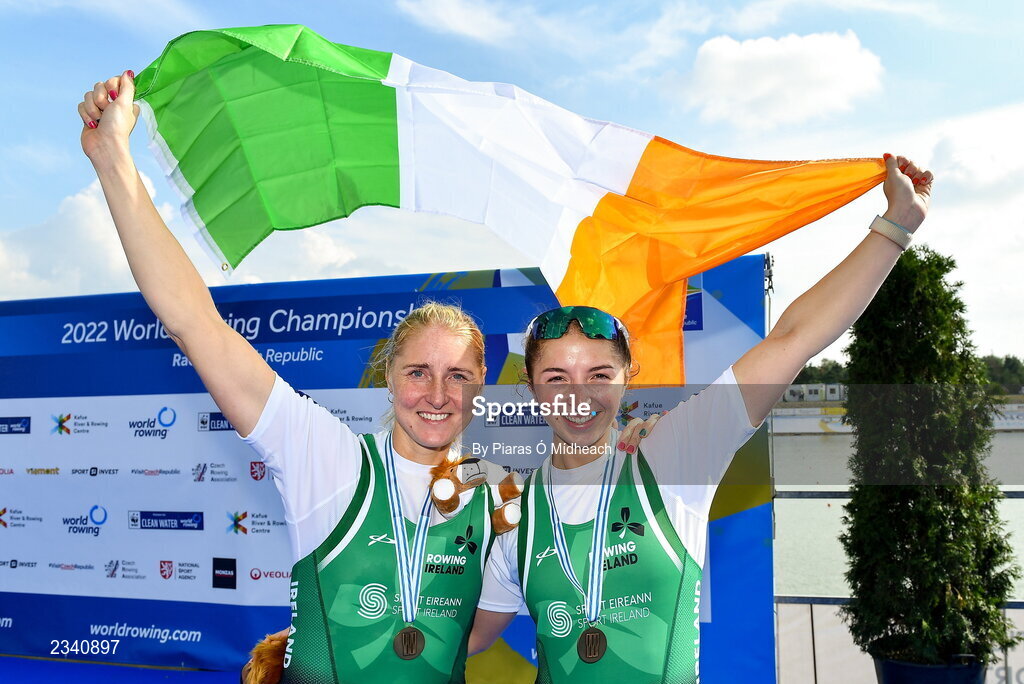 25 September 2022; Sanita Puspure, left, and Zoe Hyde of Ireland celebrate with their bronze medals after finishing third in the Women's Double Sculls Final A, in a time of 06:52.81, during day 8 of the World Rowing Championships 2022 at Racice in Czech Republic. Photo by Piaras Ó Mídheach/Sportsfile