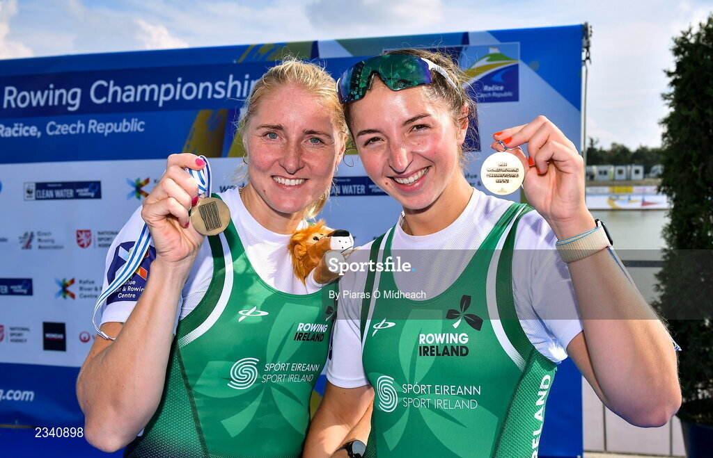 25 September 2022; Sanita Puspure, left, and Zoe Hyde of Ireland celebrate with their bronze medals after finishing third in the Women's Double Sculls Final A, in a time of 06:52.81, during day 8 of the World Rowing Championships 2022 at Racice in Czech Republic. Photo by Piaras Ó Mídheach/Sportsfile