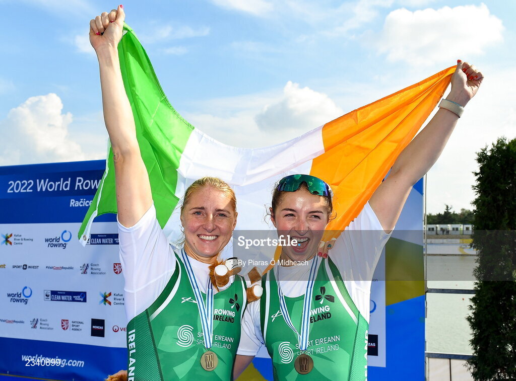 25 September 2022; Sanita Puspure, left, and Zoe Hyde of Ireland celebrate with their bronze medals after finishing third in the Women's Double Sculls Final A, in a time of 06:52.81, during day 8 of the World Rowing Championships 2022 at Racice in Czech Republic. Photo by Piaras Ó Mídheach/Sportsfile