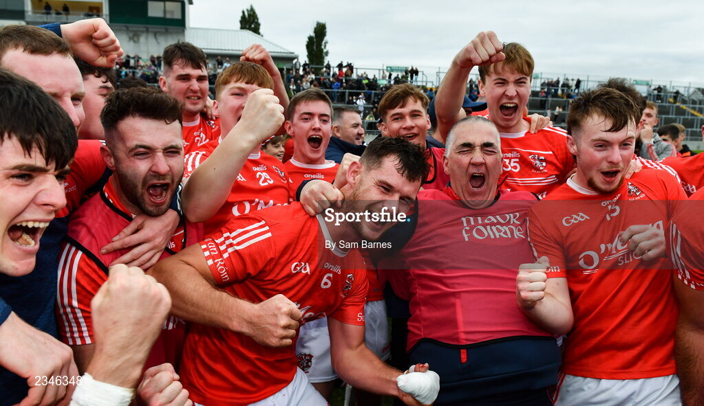 2 October 2022; Shinrone players  and backroom staff celebrate after their side's victory in the Offaly County Senior Hurling Championship Final match between Kilcormac-Killoughey and Shinrone at O'Connor Park in Tullamore, Offaly. Photo by Sam Barnes/Sportsfile