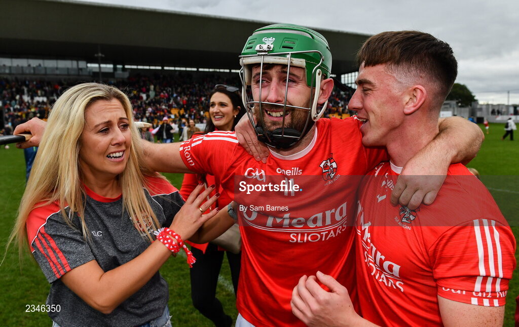 2 October 2022; Donal Morkan of Shinrone, centre, celebrates with his sister Debbie Morkan, and team-mate Joe Cleary after his side's victory in the Offaly County Senior Hurling Championship Final match between Kilcormac-Killoughey and Shinrone at O'Connor Park in Tullamore, Offaly. Photo by Sam Barnes/Sportsfile