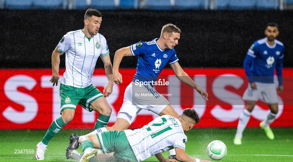 6 October 2022; Sivert Mannsverk of Molde in action against Aaron Greene, left, and Justin Ferizaj of Shamrock Rovers during the UEFA Europa Conference League group F match between Molde and Shamrock Rovers at Aker Stadion in Molde, Norway. Photo by Marius Simensen/Sportsfile
