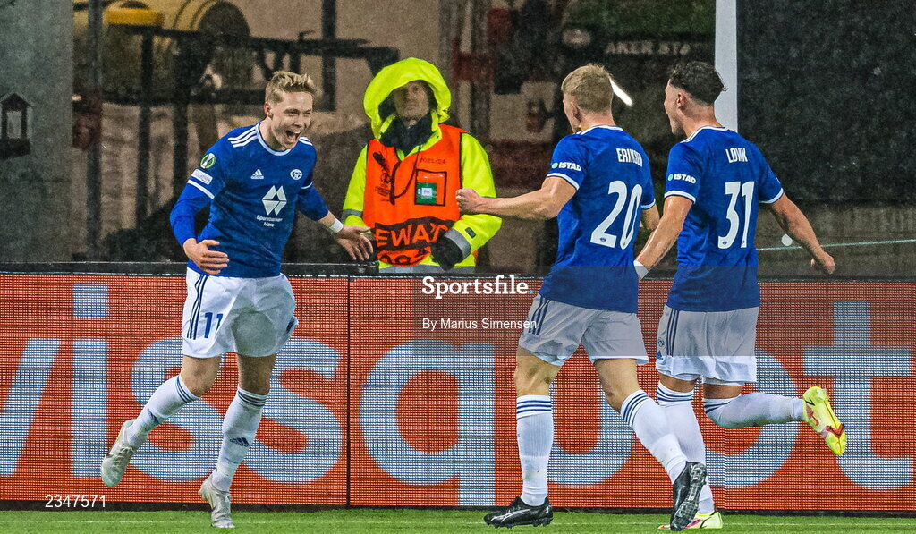 6 October 2022; Ola Brynhildsen of Molde, right, celebrates with teammates Kristian Eriksen, 20, and Mathias Fjørtoft Løvik after scoring their side's first goal during the UEFA Europa Conference League group F match between Molde and Shamrock Rovers at Aker Stadion in Molde, Norway. Photo by Marius Simensen/Sportsfile