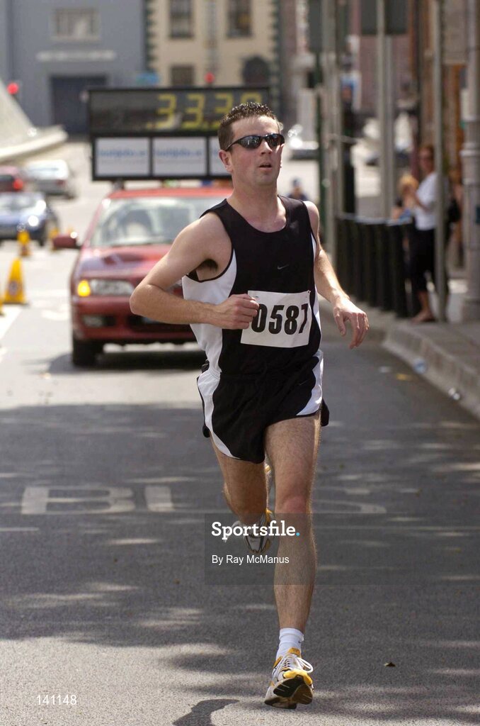29 May 2004; Neil Cusack, from Limerick, wins the 10k Calcutta Run, a race in aid of GOAL and the Arrupe Society for homeless children in Calcutta and Dublin. Law Society of Ireland, Blackhall Place, Dublin. Picture credit; Ray McManus / SPORTSFILE