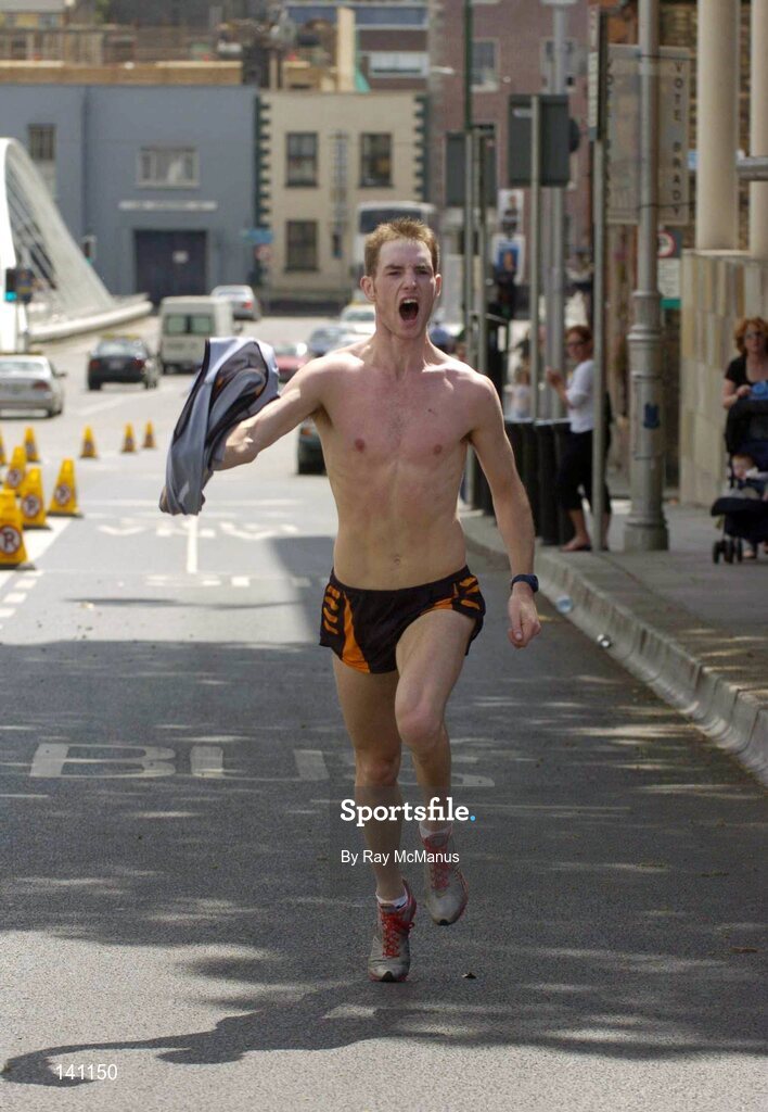 29 May 2004; Kevin English, Tallght, Dublin, clebrates his finishing second in the 10k Calcutta Run, a race in aid of GOAL and the Arrupe Society for homeless children in Calcutta and Dublin. Law Society of Ireland, Blackhall Place, Dublin. Picture credit; Ray McManus / SPORTSFILE