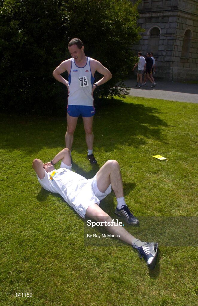 29 May 2004; Brothers Paul and Patrick Caralon, from Cavan, relax after competing in the 10k Calcutta Run, a race in aid of GOAL and the Arrupe Society for homeless children in Calcutta and Dublin. Law Society of Ireland, Blackhall Place, Dublin. Picture credit; Ray McManus / SPORTSFILE