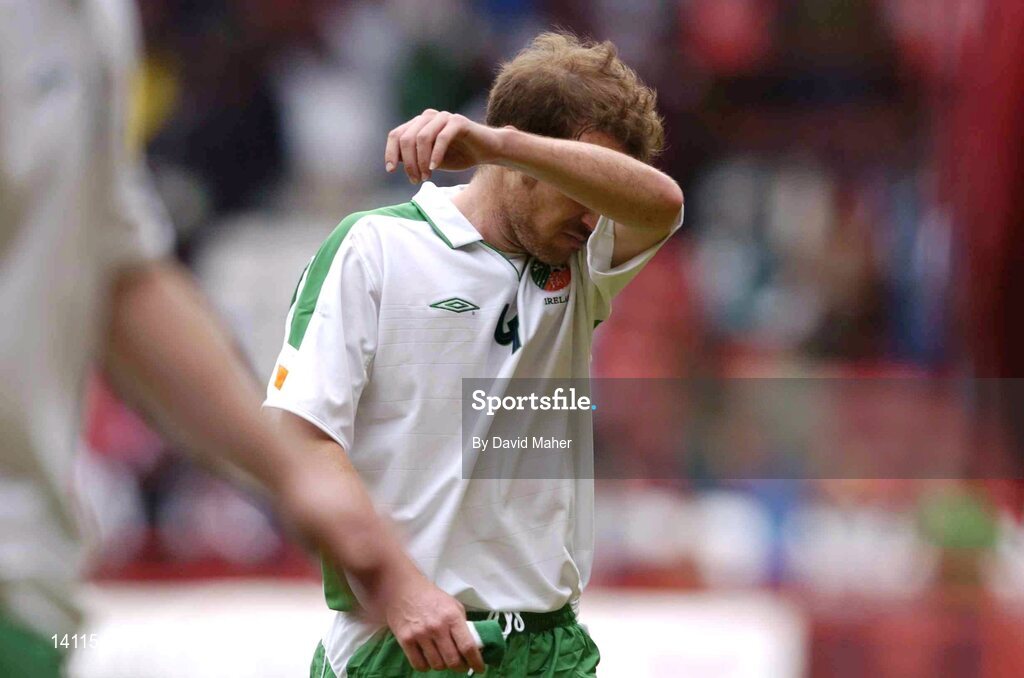 29 May 2004; A dejected Kenny Cunningham, Republic of Ireland, at the end of the game after defeat to Nigeria. Unity Cup, Republic of Ireland v Nigeria, The Valley, London. Picture credit; David Maher / SPORTSFILE