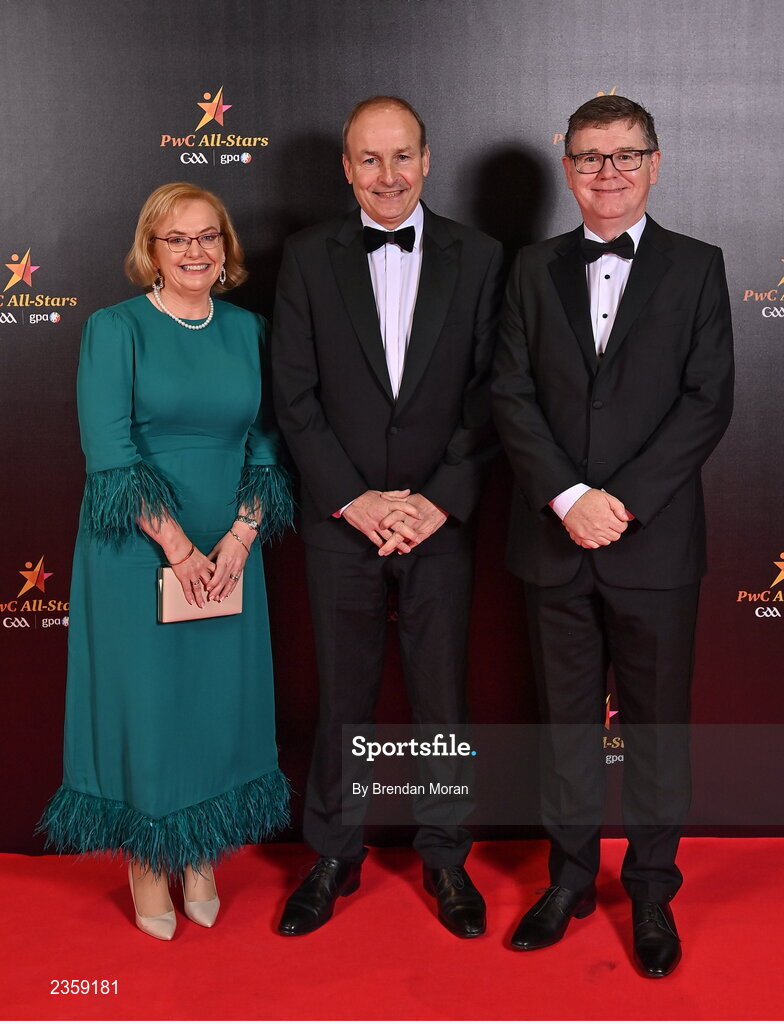 28 October 2022; An Taoiseach Micheál Martin TD, Ard Stiúrthóir of the GAA Tom Ryan and Mairéad O'Malley on arrival at the PwC All-Stars Awards 2022 at the Convention Centre in Dublin. Photo by Brendan Moran/Sportsfile