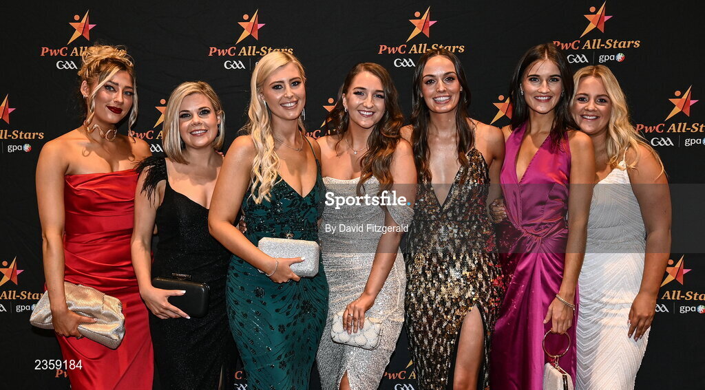 28 October 2022; Partners of Kerry players, from left, Orla O'Mahony, Emer McCarthy, Tara Casey, Molly O'Brien, Ciara Breathnach, Laura Daly, and Shauna O'Connor on arrival at the PwC All-Stars Awards 2022 at the Convention Centre in Dublin. Photo by David Fitzgerald/Sportsfile