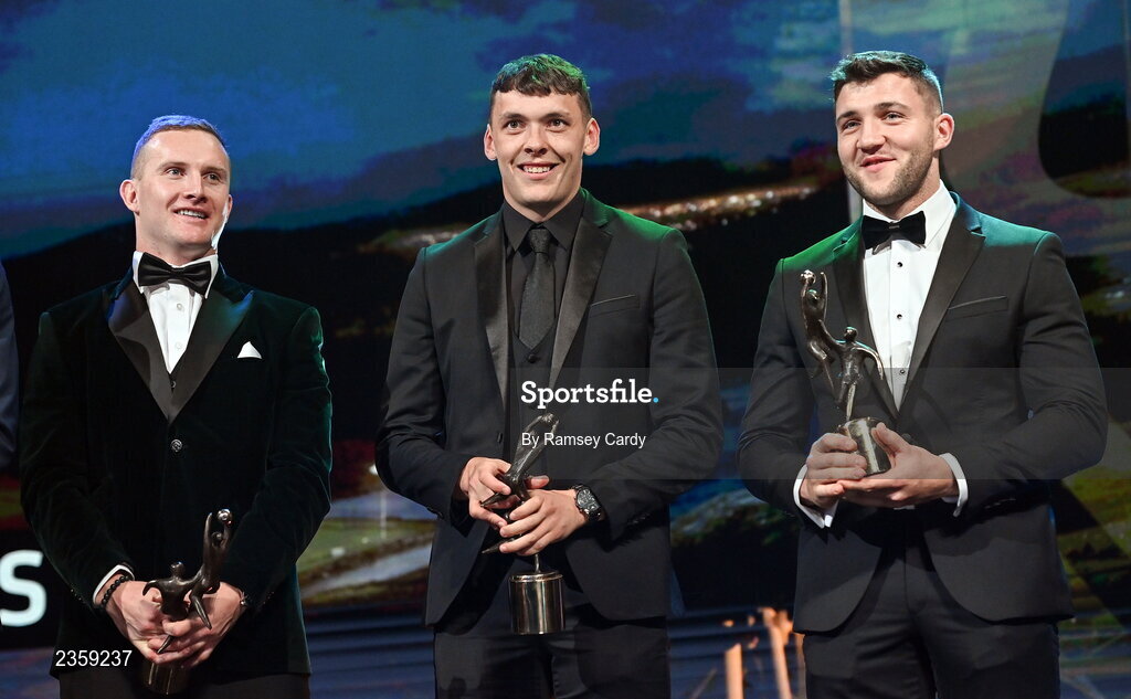 28 October 2022; Ciarán Kilkenny of Dublin, left, David Clifford of Kerry, centre, and Damien Comer of Galway with their PwC All-Star awards during the PwC All-Stars Awards 2022 show at the Convention Centre in Dublin. Photo by Ramsey Cardy/Sportsfile