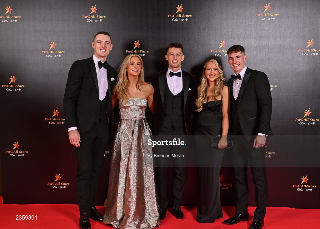28 October 2022; From left, Brian Fenton of Dublin, Katie Molloy, Evan Comerford, Ellen Healy, and Lee Gannon on arrival at the PwC All-Stars Awards 2022 at the Convention Centre in Dublin. Photo by Brendan Moran/Sportsfile