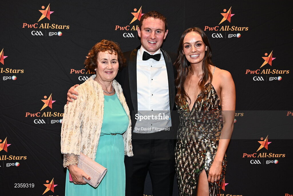28 October 2022; Tadhg Morley of Kerry and Ciara Breathnach, with Tadhg's mother Threresa on arrival at the PwC All-Stars Awards 2022 at the Convention Centre in Dublin. Photo by David Fitzgerald/Sportsfile