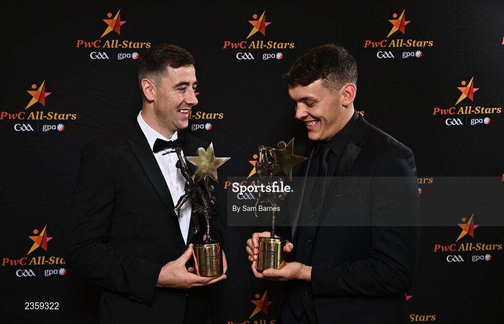 28 October 2022; Diarmaid Byrnes of Limerick, left, and David Clifford of Kerry, with their PwC All Star Player of the Year awards at the PwC All-Stars Awards 2022 at the Convention Centre in Dublin. Photo by Sam Barnes/Sportsfile