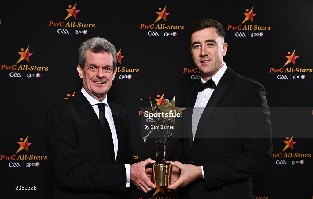 28 October 2022; PwC Ireland Managing Partner Feargal O'Rourke, left, and Diarmaid Byrnes of Limerick with his PwC All Star Player of the Year award at the PwC All-Stars Awards 2022 at the Convention Centre in Dublin. Photo by Sam Barnes/Sportsfile