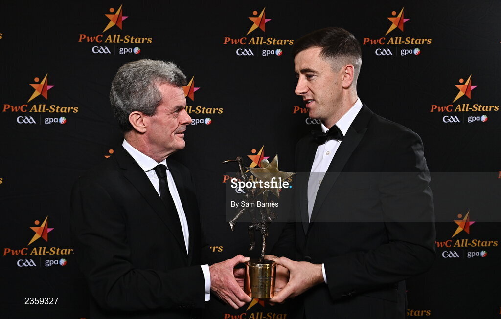 28 October 2022; PwC Ireland Managing Partner Feargal O'Rourke, left, and Diarmaid Byrnes of Limerick with his PwC All Star Player of the Year award at the PwC All-Stars Awards 2022 at the Convention Centre in Dublin. Photo by Sam Barnes/Sportsfile