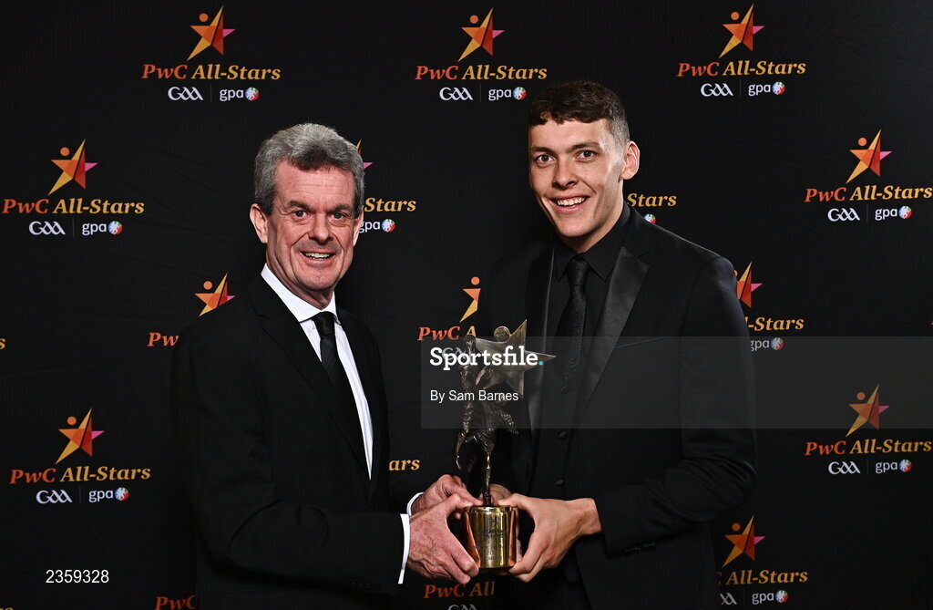 28 October 2022; PwC Ireland Managing Partner Feargal O'Rourke, left, and David Clifford of Kerry with his PwC Player of the Year at the PwC All-Stars Awards 2022 at the Convention Centre in Dublin. Photo by Sam Barnes/Sportsfile