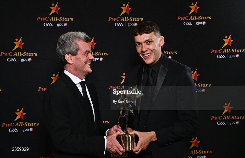 28 October 2022; PwC Ireland Managing Partner Feargal O'Rourke, left, and David Clifford of Kerry with his PwC Player of the Year at the PwC All-Stars Awards 2022 at the Convention Centre in Dublin. Photo by Sam Barnes/Sportsfile