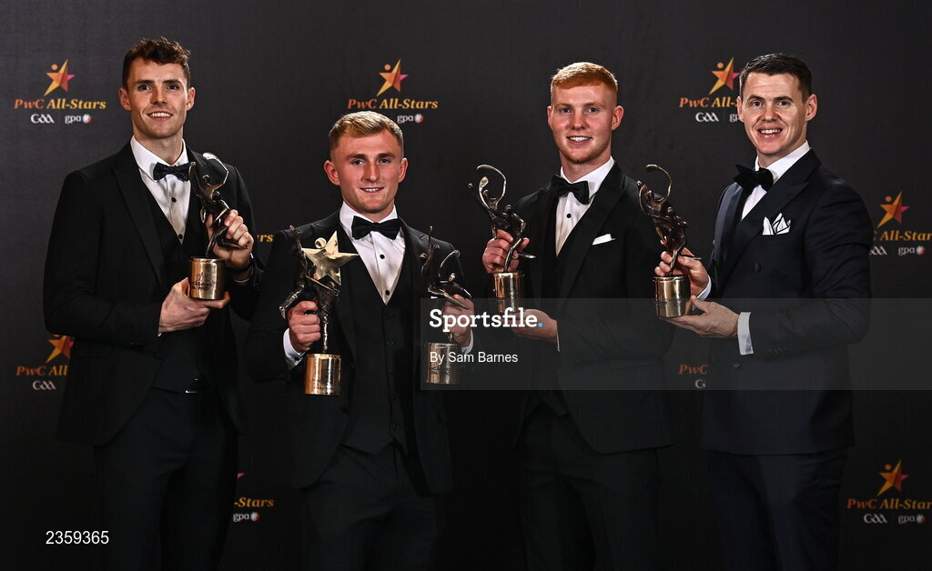 28 October 2022; Kilkenny hurlers, from left, Huw Lawlor, Mikey Butler, Adrian Mullen and TJ Reid with their PwC All-Star awards at the PwC All-Stars Awards 2022 at the Convention Centre in Dublin.  Photo by Sam Barnes/Sportsfile