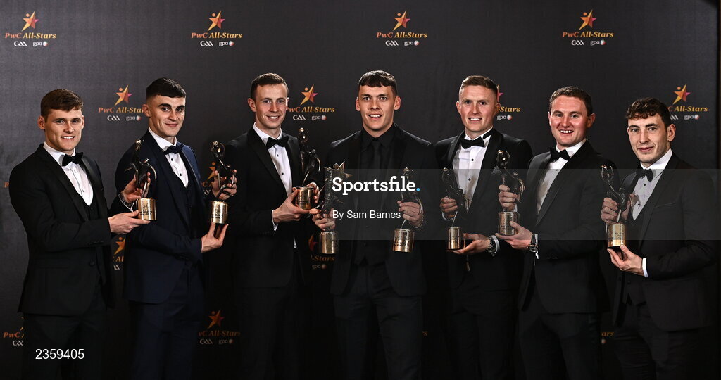 28 October 2022; Kerry footballers, from left, Gavin White, Sean O'Shea, Shane Ryan, David Clifford, Jason Foley, Tadhg Morley, and Paudie Clifford with their PwC All Star awards at the PwC All-Stars Awards 2022 at the Convention Centre in Dublin. Photo by Sam Barnes/Sportsfile