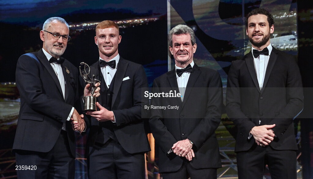 28 October 2022; Adrian Mullen of Kilkenny is presented with his PwC All-Star award by Uachtarán Chumann Lúthchleas Gael Larry McCarthy, PwC Ireland managing partner Feargal O'Rourke and GPA chief executive officer Tom Parsons during the PwC All-Stars Awards 2022 show at the Convention Centre in Dublin. Photo by Ramsey Cardy/Sportsfile