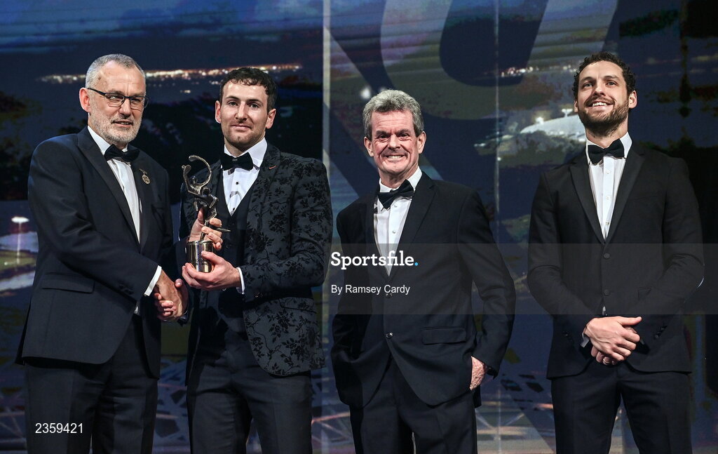 28 October 2022; Pádraic Mannion of Galway is presented with his PwC All-Star award by Uachtarán Chumann Lúthchleas Gael Larry McCarthy, PwC Ireland managing partner Feargal O'Rourke and GPA chief executive officer Tom Parsons during the PwC All-Stars Awards 2022 show at the Convention Centre in Dublin. Photo by Ramsey Cardy/Sportsfile