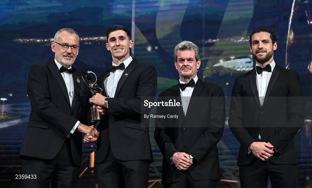 28 October 2022; Barry Nash of Limerick is presented with his PwC All-Star award by Uachtarán Chumann Lúthchleas Gael Larry McCarthy, PwC Ireland managing partner Feargal O'Rourke and GPA chief executive officer Tom Parsons during the PwC All-Stars Awards 2022 show at the Convention Centre in Dublin. Photo by Ramsey Cardy/Sportsfile