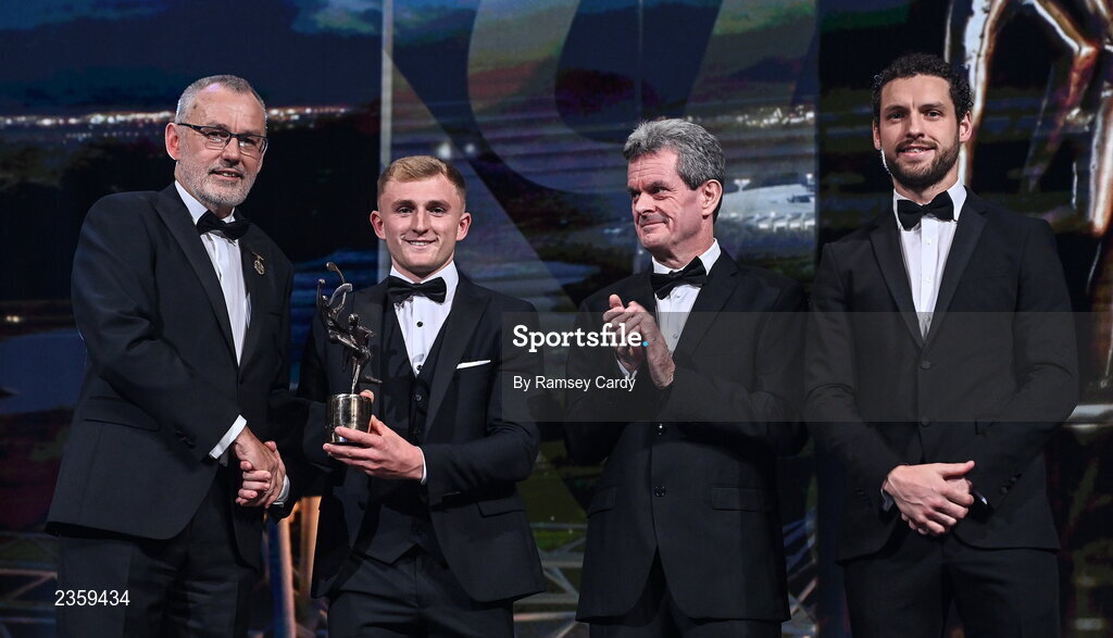 28 October 2022; Mikey Butler of Kilkenny is presented with his PwC All-Star award by Uachtarán Chumann Lúthchleas Gael Larry McCarthy, PwC Ireland managing partner Feargal O'Rourke and GPA chief executive officer Tom Parsons during the PwC All-Stars Awards 2022 show at the Convention Centre in Dublin. Photo by Ramsey Cardy/Sportsfile