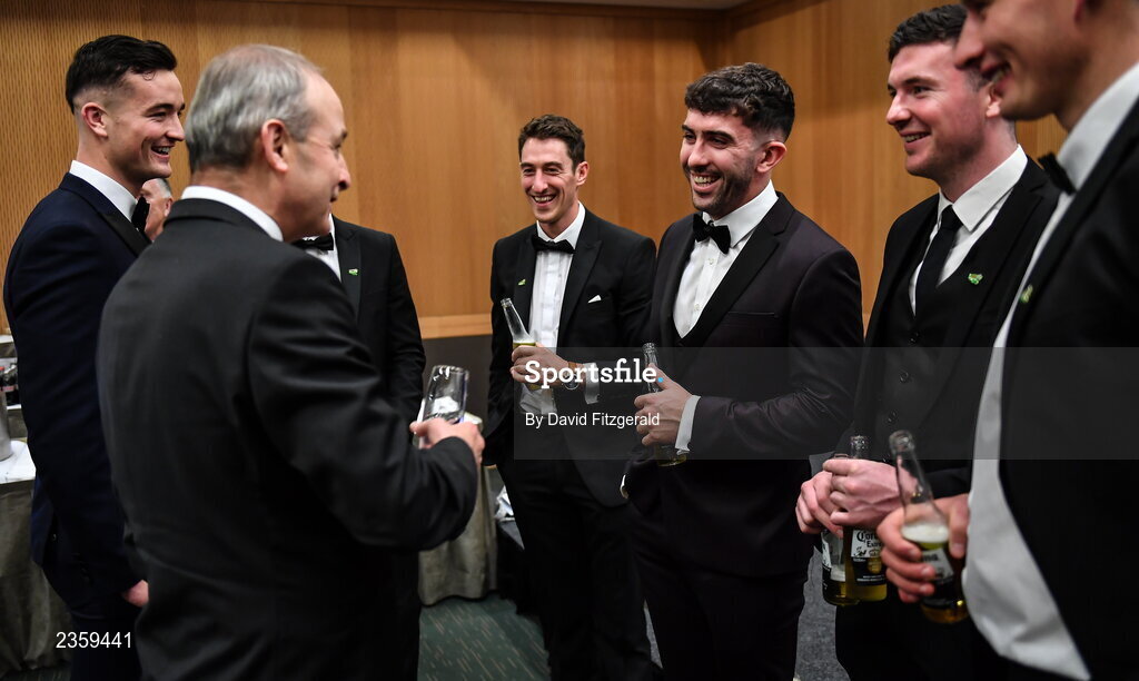 28 October 2022; An Taoiseach Micheál Martin TD with Limerick hurlers, from left, Kyle Hayes, Nickie Quaid, Aaron Gillane, Declan Hannon and Gearoid Hegarty at the PwC All-Stars Awards 2022 at the Convention Centre in Dublin.  Photo by David Fitzgerald/Sportsfile