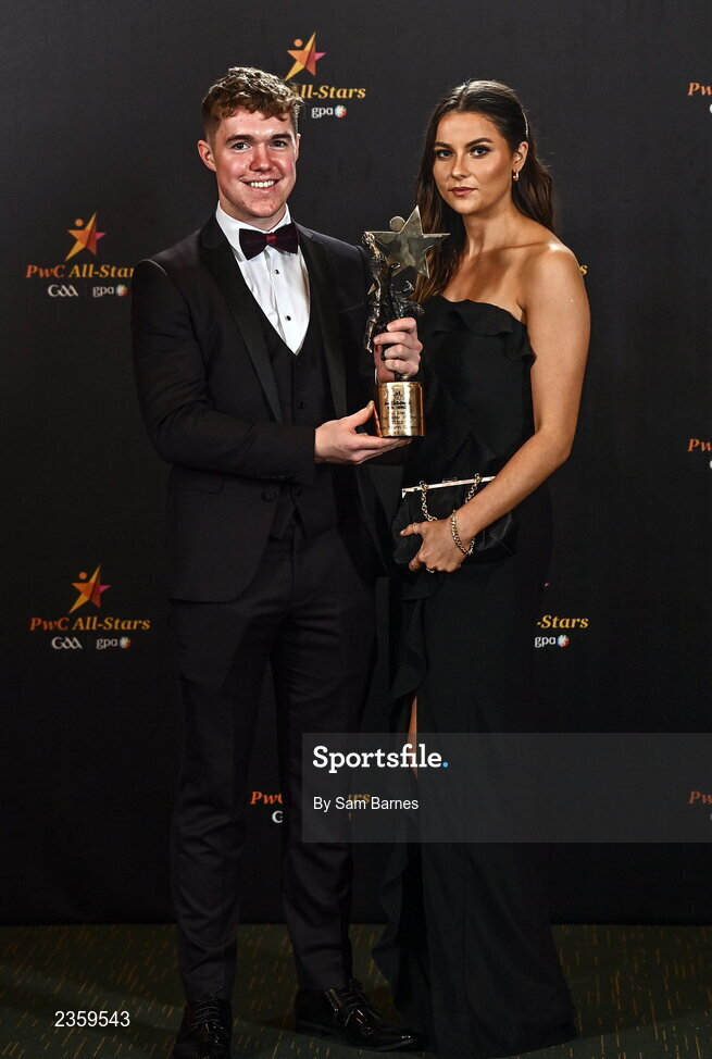 28 October 2022; PwC GAA/GPA Young Footballer of the Year Jack Glynn of Galway with Roisin Mannion and his PwC Young Player of the Year award at the PwC All-Stars Awards 2022 at the Convention Centre in Dublin. Photo by Sam Barnes/Sportsfile