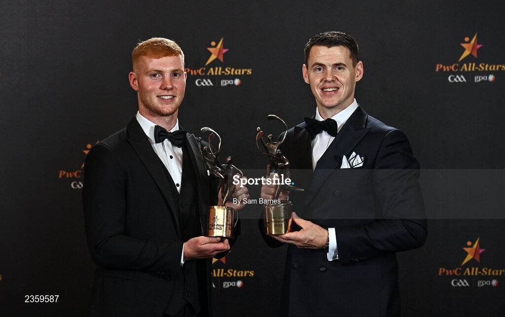 28 October 2022; Kilkenny and Shamrocks Ballyhale hurlers, from left, Adrian Mullen and TJ Reid with their PwC All-Star awards at the PwC All-Stars Awards 2022 at the Convention Centre in Dublin. Photo by Sam Barnes/Sportsfile
