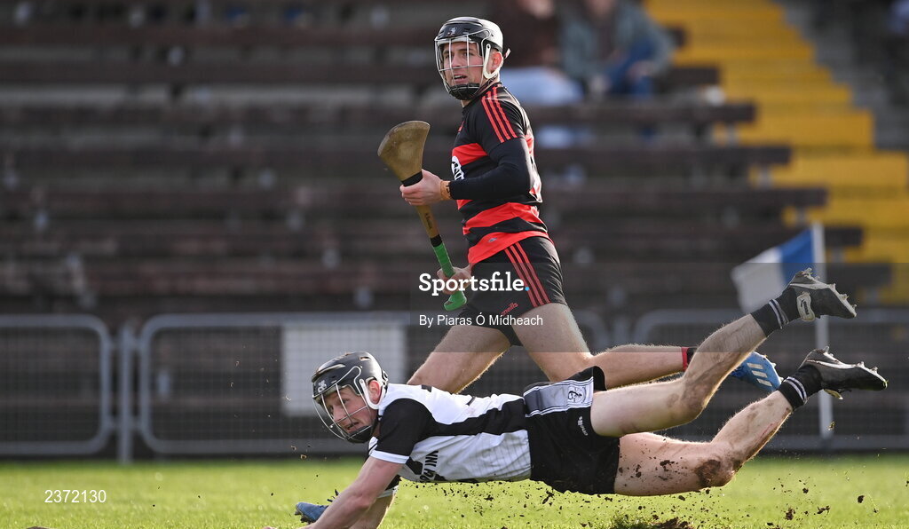 6 November 2022; Harry Ruddle of Ballygunner watches his shot hit the net for his side's third goal as Jerome Cahill of Kilruane MacDonagh's looks on during the AIB Munster GAA Hurling Senior Club Championship quarter-final match between Ballygunner and Kilruane MacDonagh's at Walsh Park in Waterford. Photo by Piaras Ó Mídheach/Sportsfile