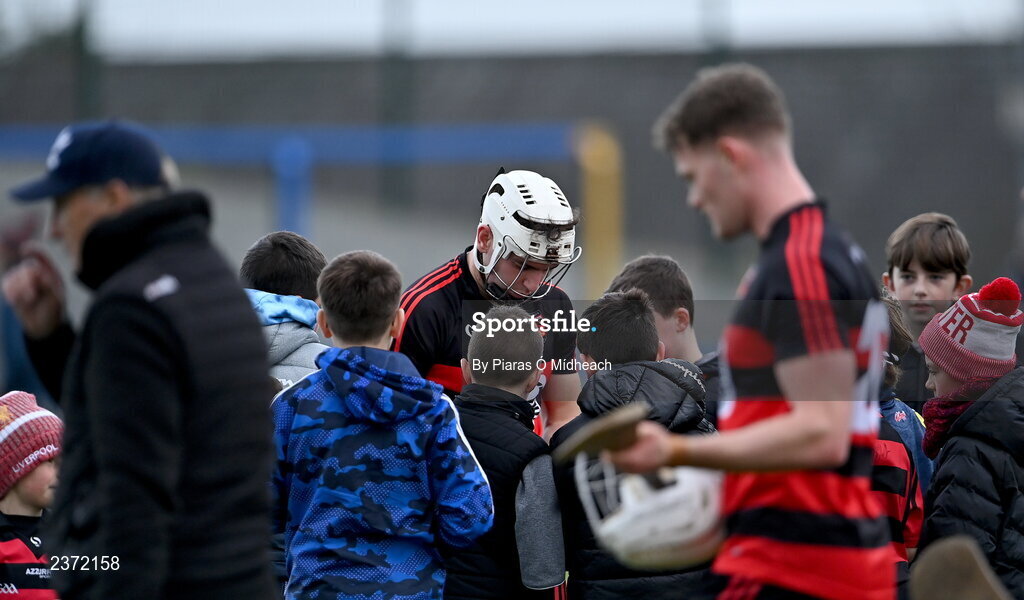6 November 2022; Dessie Hutchinson of Ballygunner signs autographs for supporters after his side's victory in the AIB Munster GAA Hurling Senior Club Championship quarter-final match between Ballygunner and Kilruane MacDonagh's at Walsh Park in Waterford. Photo by Piaras Ó Mídheach/Sportsfile