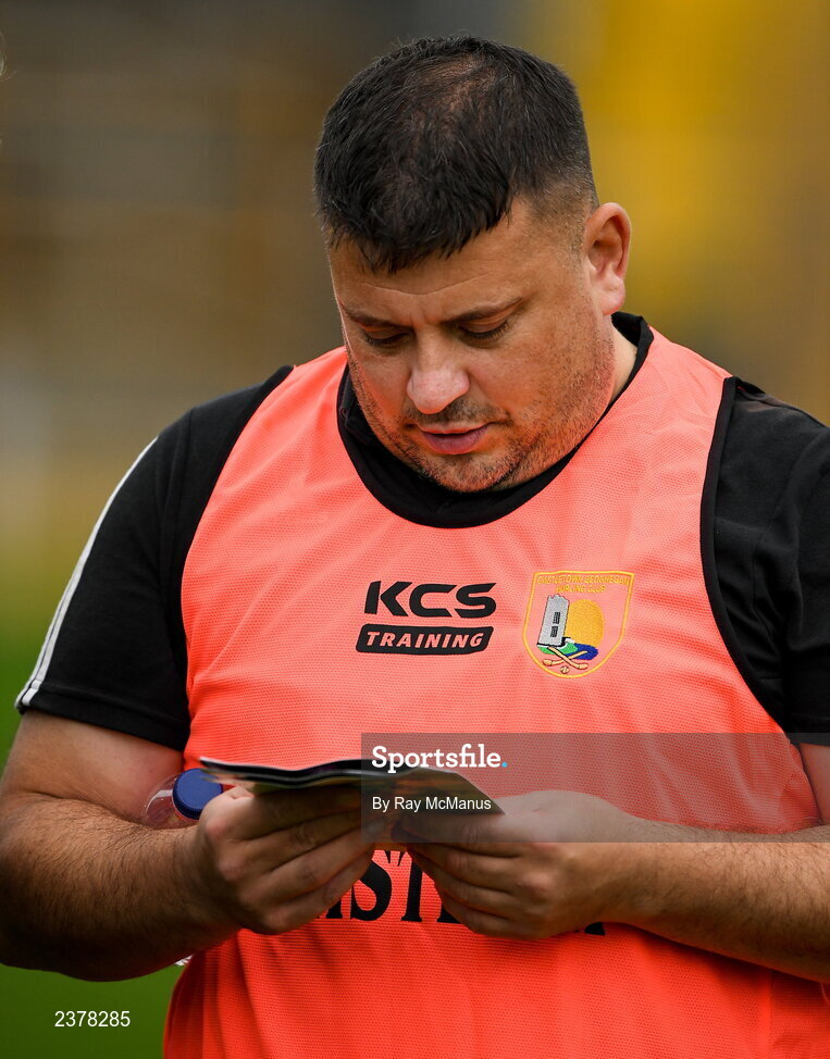 13 November 2022; Castletown Geoghegan manager Alan "Budda" Mangan reads his match programme before the AIB Leinster GAA Hurling Senior Club Championship Quarter-Final match between Shamrocks Ballyhale and Castletown Geoghegan at UPMC Nowlan Park in Kilkenny. Photo by Ray McManus/Sportsfile
