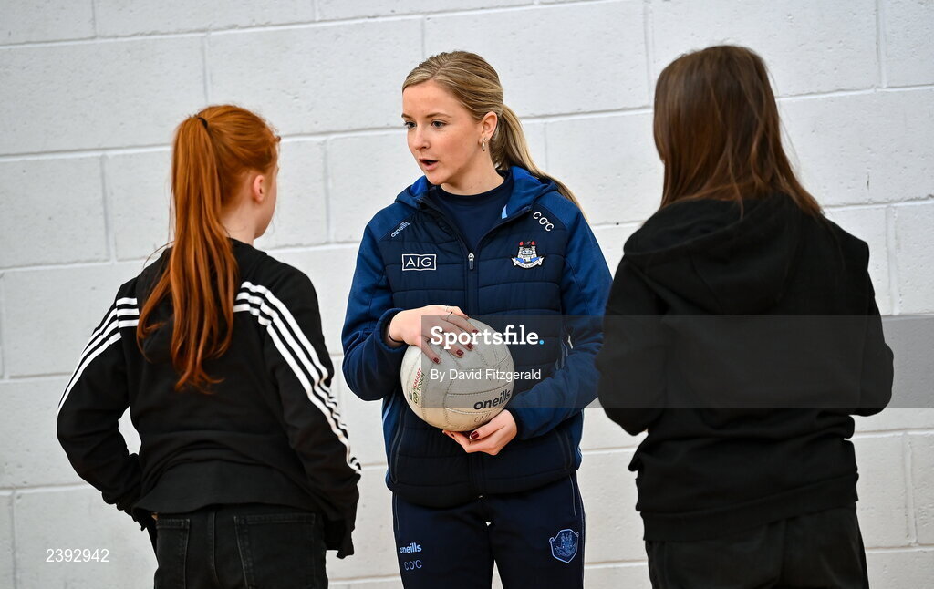 7 December 2022; Dublin ladies footballer Caoimhe O’Connor during a training session for students of Tyrrelstown Educate Together National School. As proud sponsors of Dublin GAA, AIG are encouraging participation in GAA around Dublin through its Diversity, Equality and Inclusion Roadshow (DEI Roadshow) at Tyrellstown ETNS in Dublin. Photo by David Fitzgerald/Sportsfile