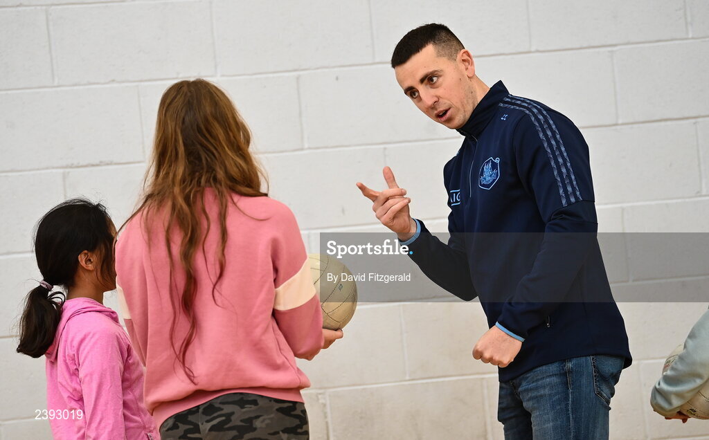7 December 2022; Dublin footballer Cormac Costello during a training session for students of Tyrrelstown Educate Together National School. As proud sponsors of Dublin GAA, AIG are encouraging participation in GAA around Dublin through its Diversity, Equality and Inclusion Roadshow (DEI Roadshow) at Tyrellstown ETNS in Dublin. Photo by David Fitzgerald/Sportsfile