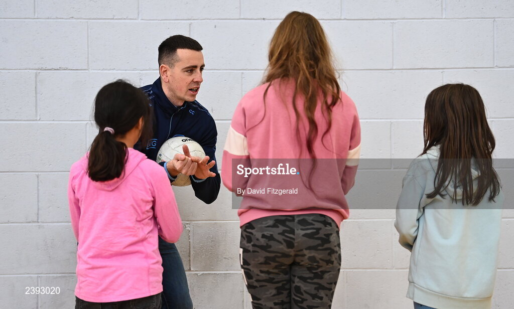 7 December 2022; Dublin footballer Cormac Costello during a training session for students of Tyrrelstown Educate Together National School. As proud sponsors of Dublin GAA, AIG are encouraging participation in GAA around Dublin through its Diversity, Equality and Inclusion Roadshow (DEI Roadshow) at Tyrellstown ETNS in Dublin. Photo by David Fitzgerald/Sportsfile