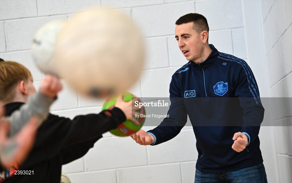 7 December 2022; Dublin footballer Cormac Costello during a training session for students of Tyrrelstown Educate Together National School. As proud sponsors of Dublin GAA, AIG are encouraging participation in GAA around Dublin through its Diversity, Equality and Inclusion Roadshow (DEI Roadshow) at Tyrellstown ETNS in Dublin. Photo by David Fitzgerald/Sportsfile